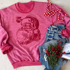 Heather red inside-out sweatshirt with vintage-inspired Santa face graphic