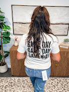 Friday Night Lights Tee in Natural (S-XL)-130 Graphic Tees-Rustee Clothing-Hello Friends Boutique-Woman's Fashion Boutique Located in Traverse City, MI